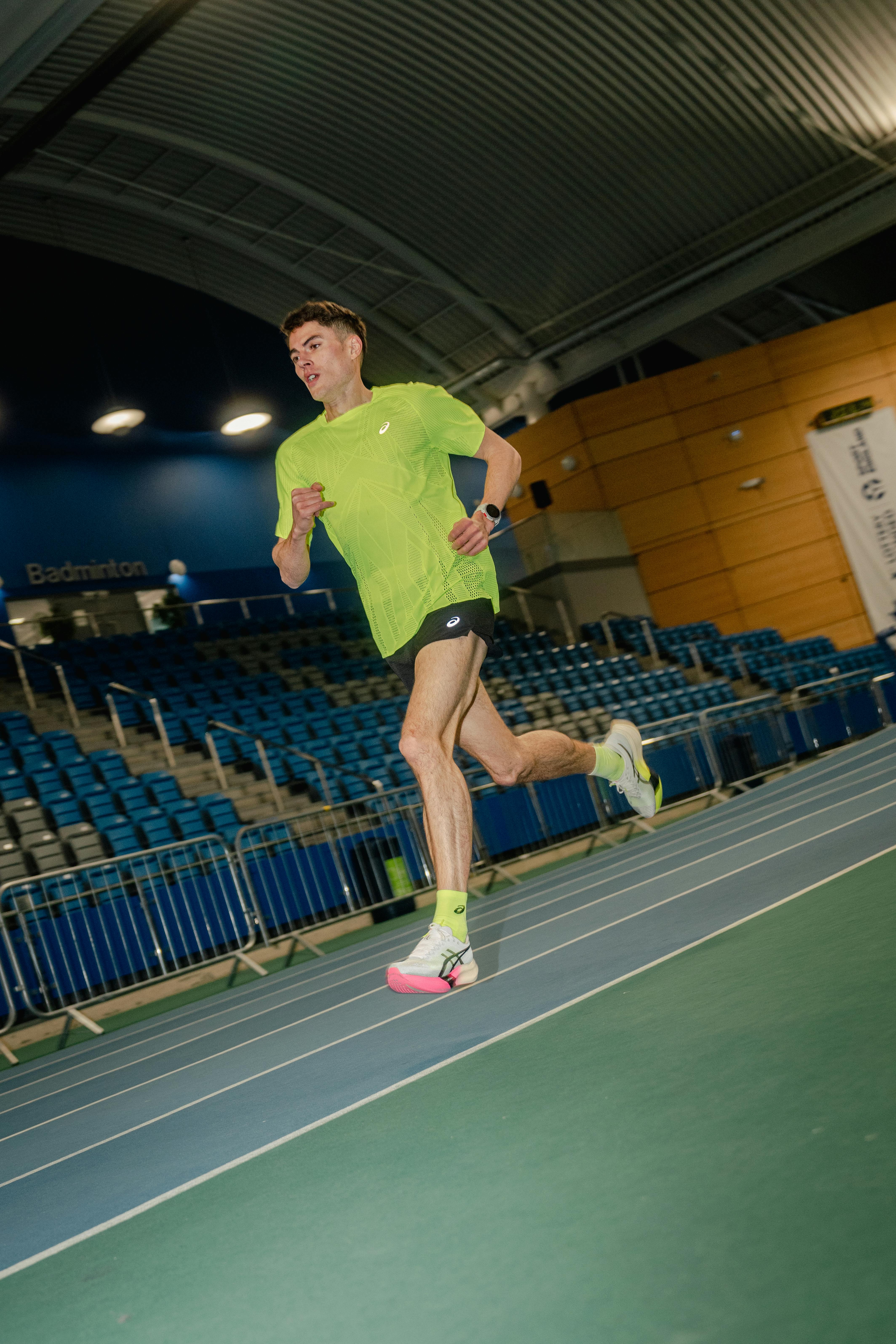 Phil running in ASICS kit 