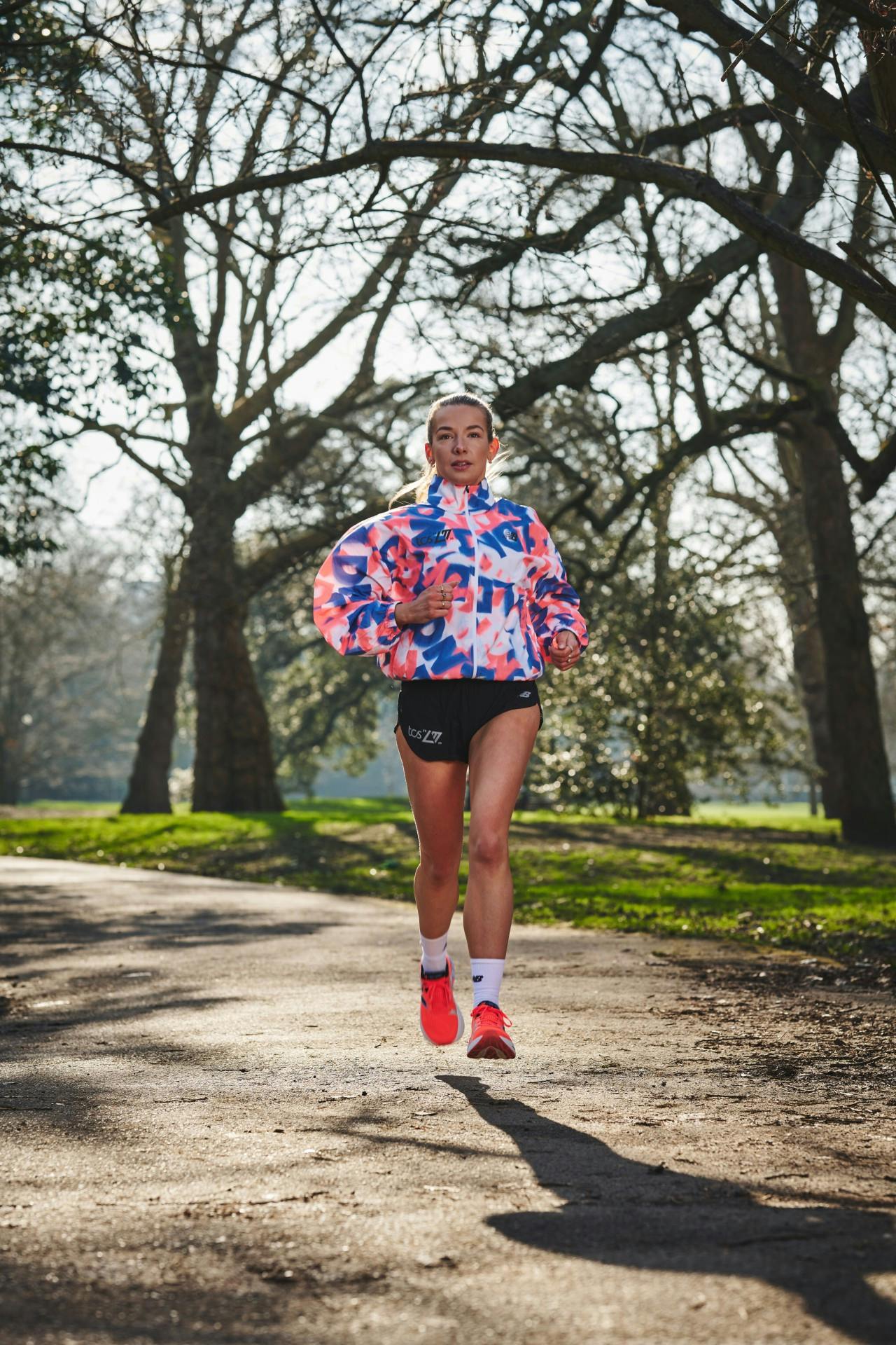 Lillie running through park 