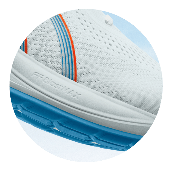 Side profile of the ASICS GEL-CUMULUS 28 in motion, highlighting the upgraded engineered mesh upper and the impact-absorbing PureGEL™ heel unit designed for reliable, everyday comfort.