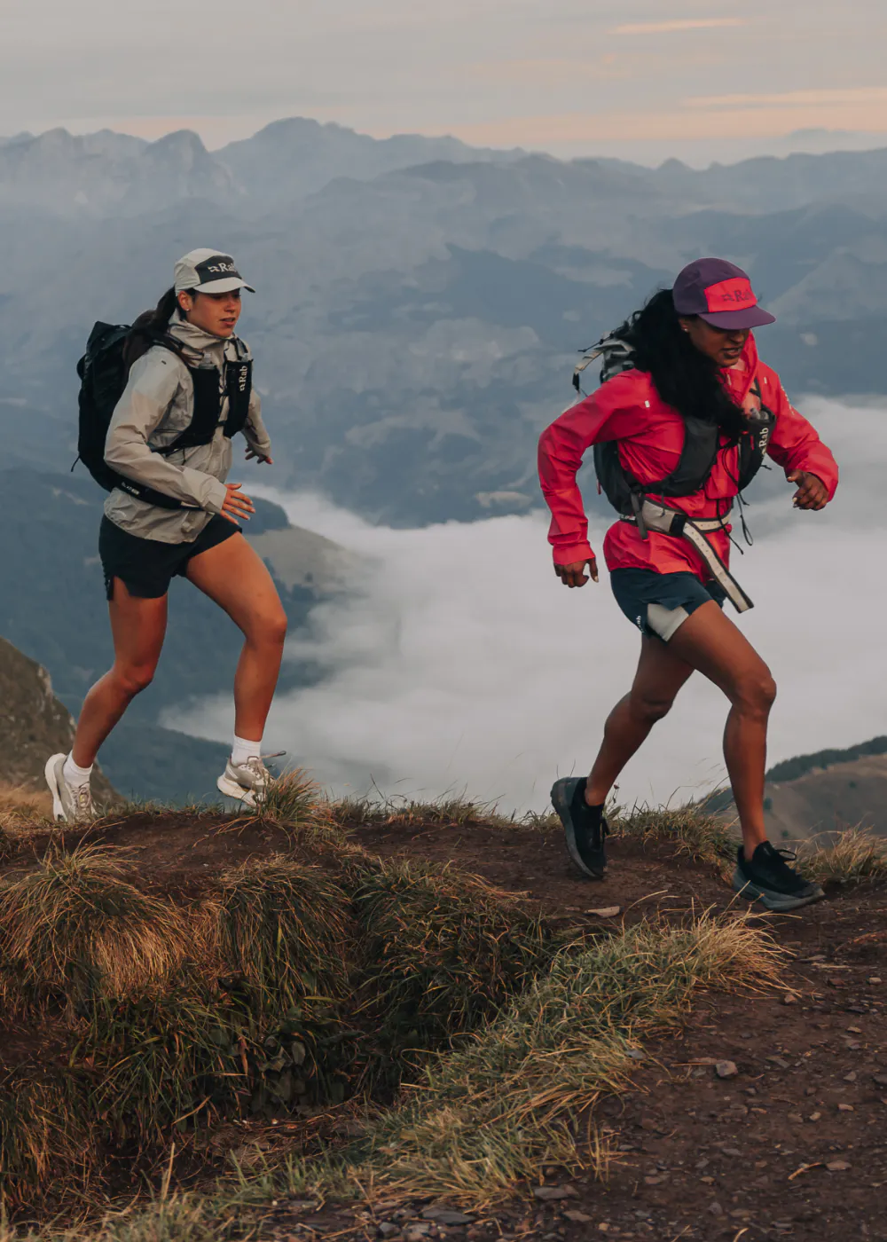 Two people running on the mountain