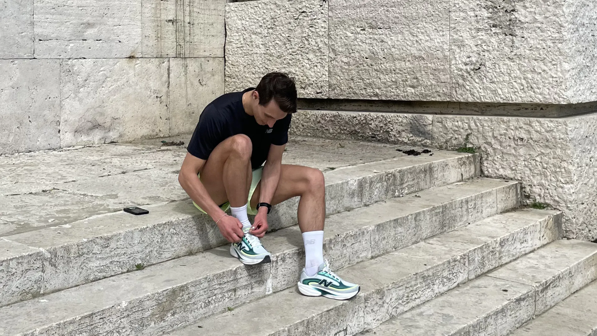 sportsshoes ambassador lacing up running shoes for rome marathon