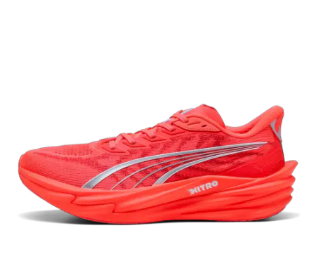 Puma Deviate Nitro carbon-plated daily trainer running shoe in Fireglow Orange and Silver—a versatile, max-cushioned road running shoe engineered with premium Nitro foam cushioning for explosive propulsion during tempo runs and everyday training.