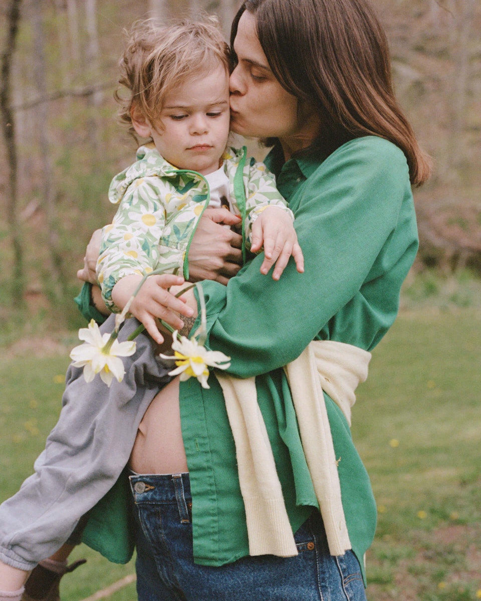 mom kissing her son