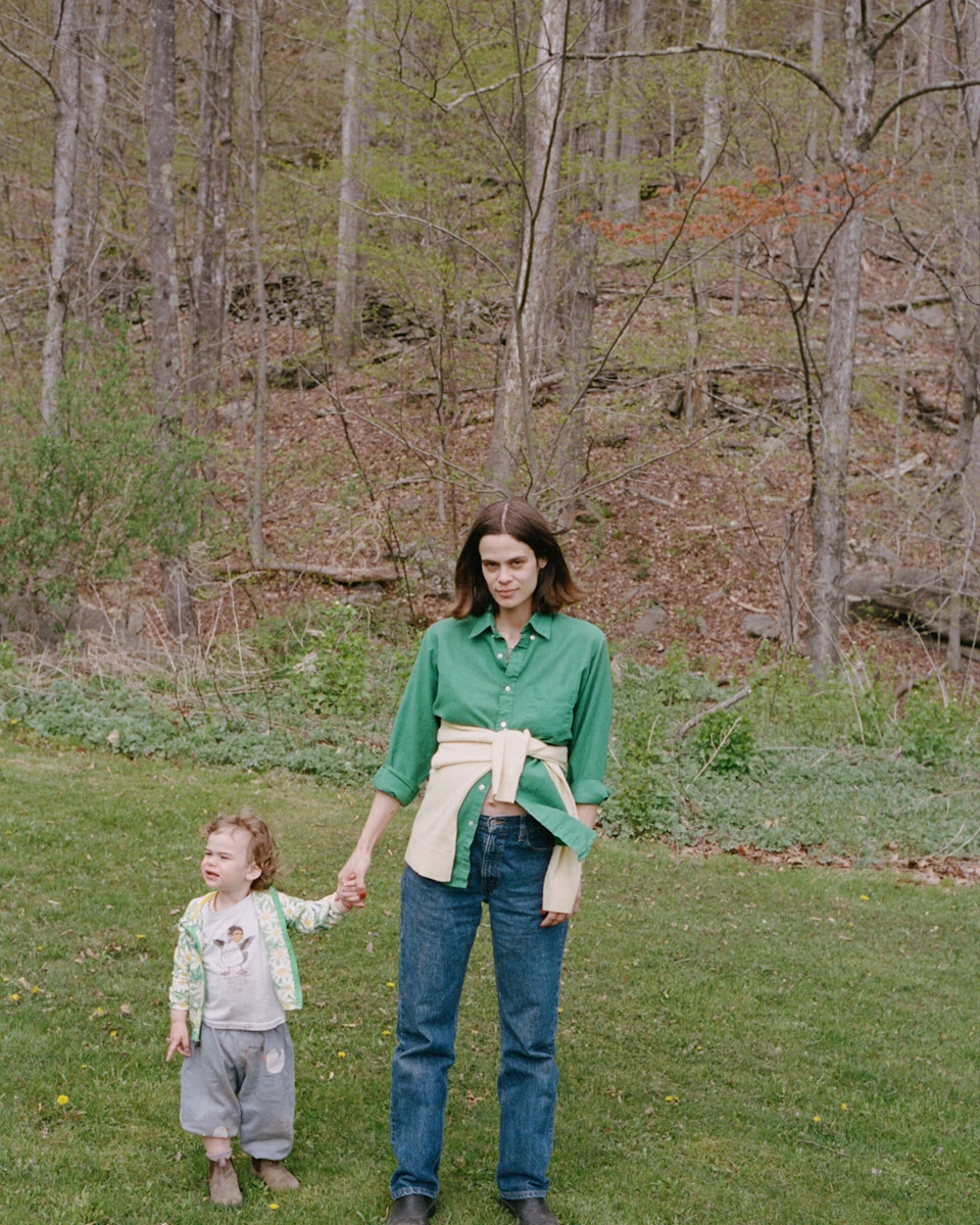 mom holding her sons hand