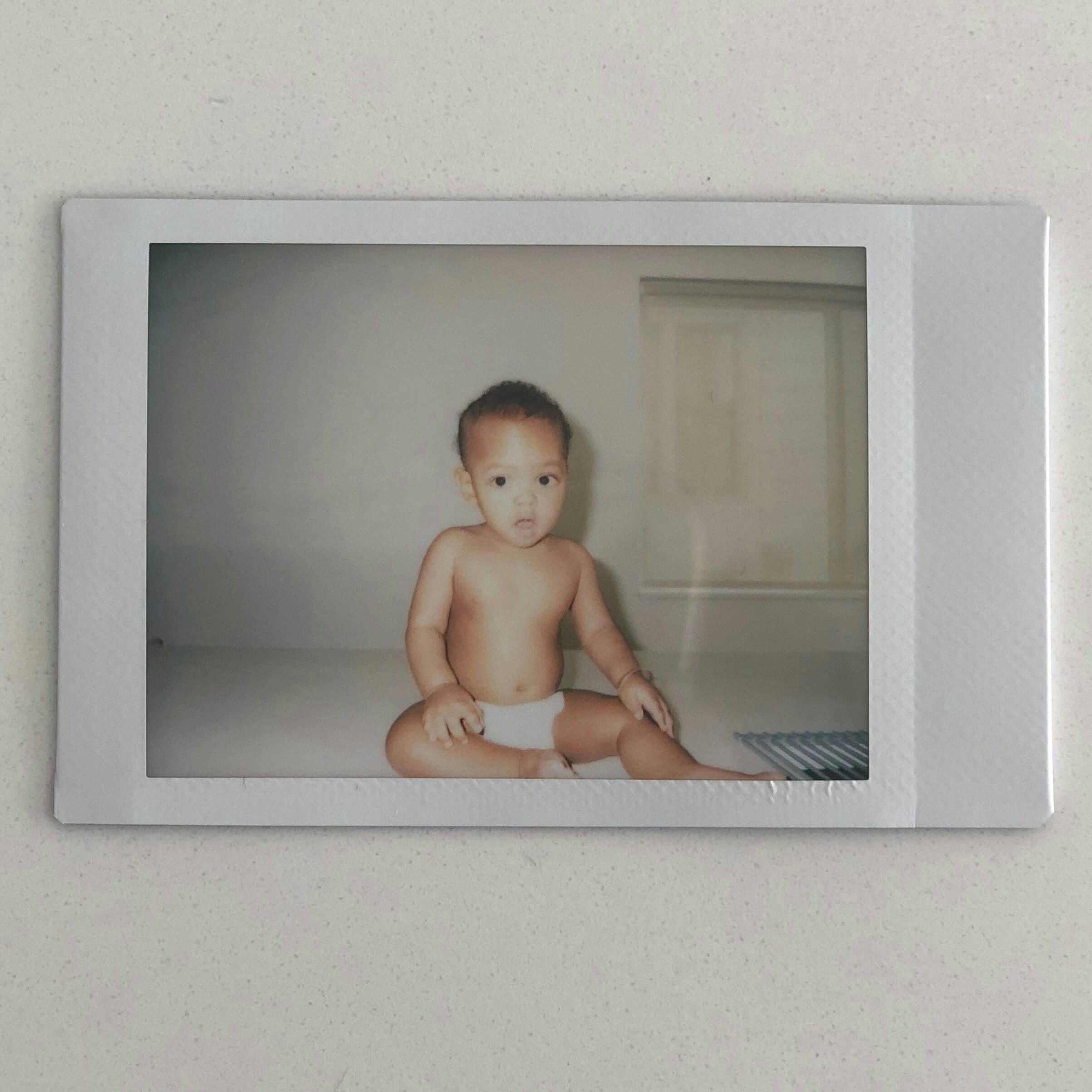 polaroid of baby girl