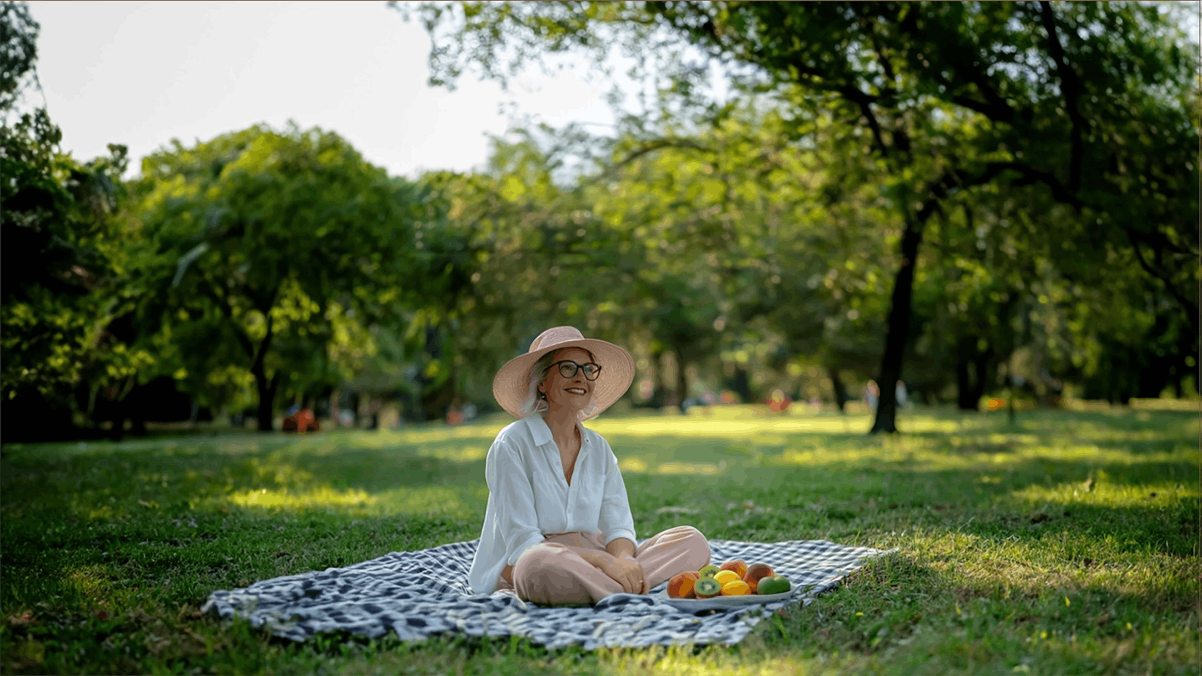 Woman having a picnic in the meadow