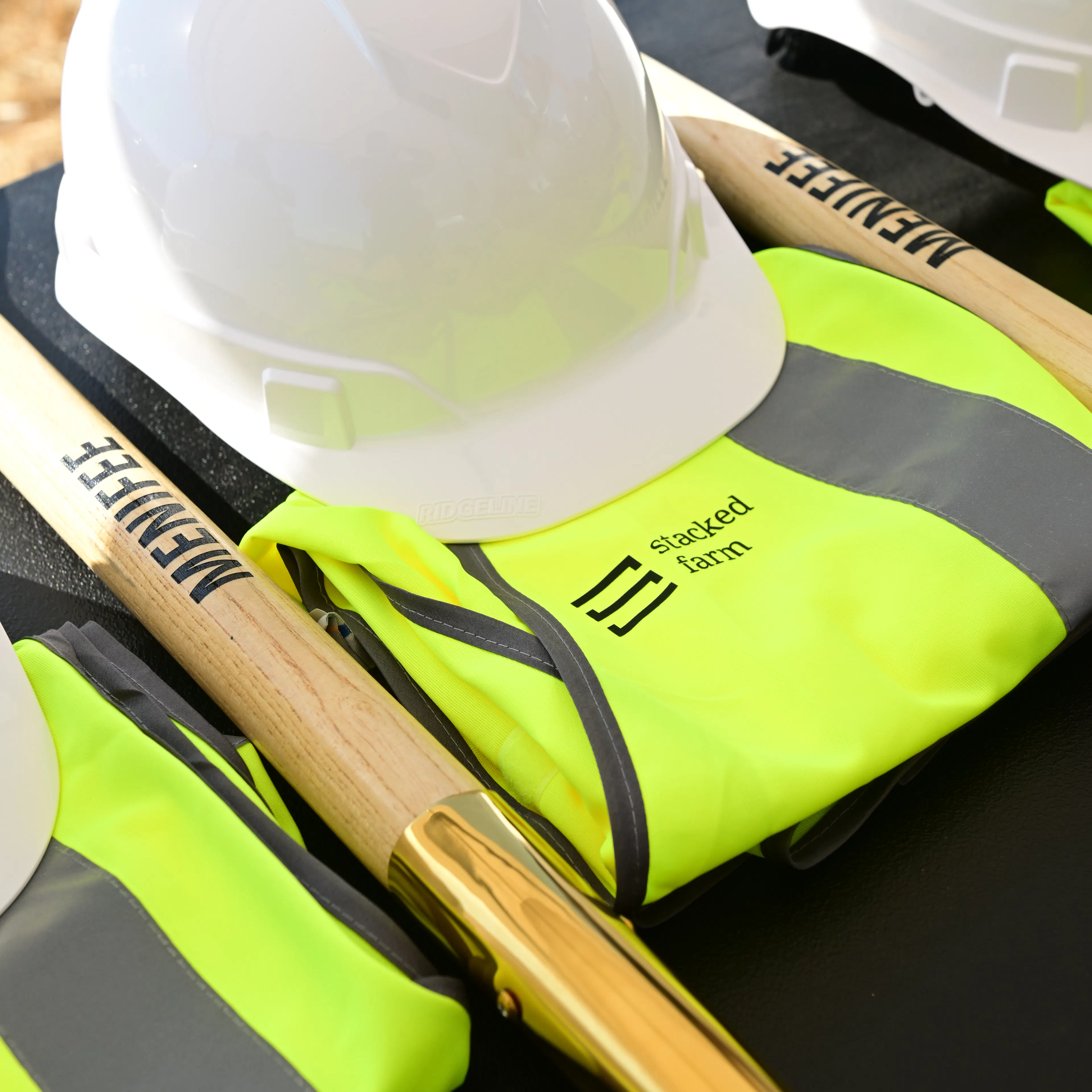 Groundbreaking picture of vest, shovel and hard hat at menifee
