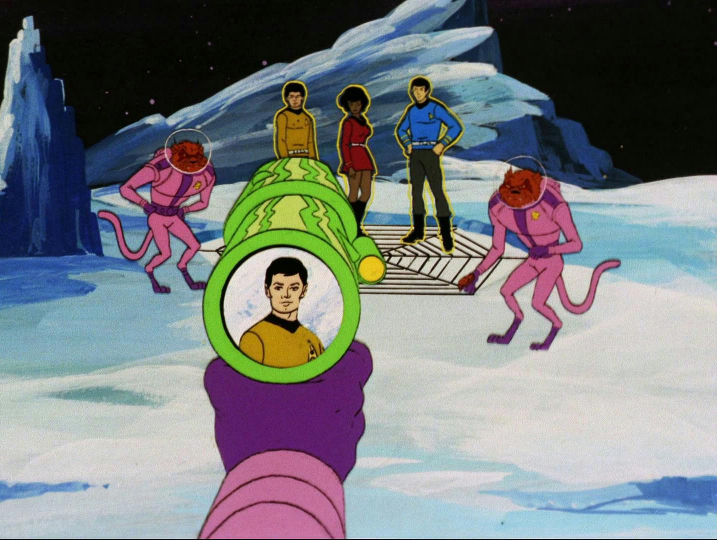 A weapon locks onto Sulu as he, Uhura, and Spock stand atop of a trap aboard a frozen planet set up by the Kzinti in 'The Slaver Weapon'