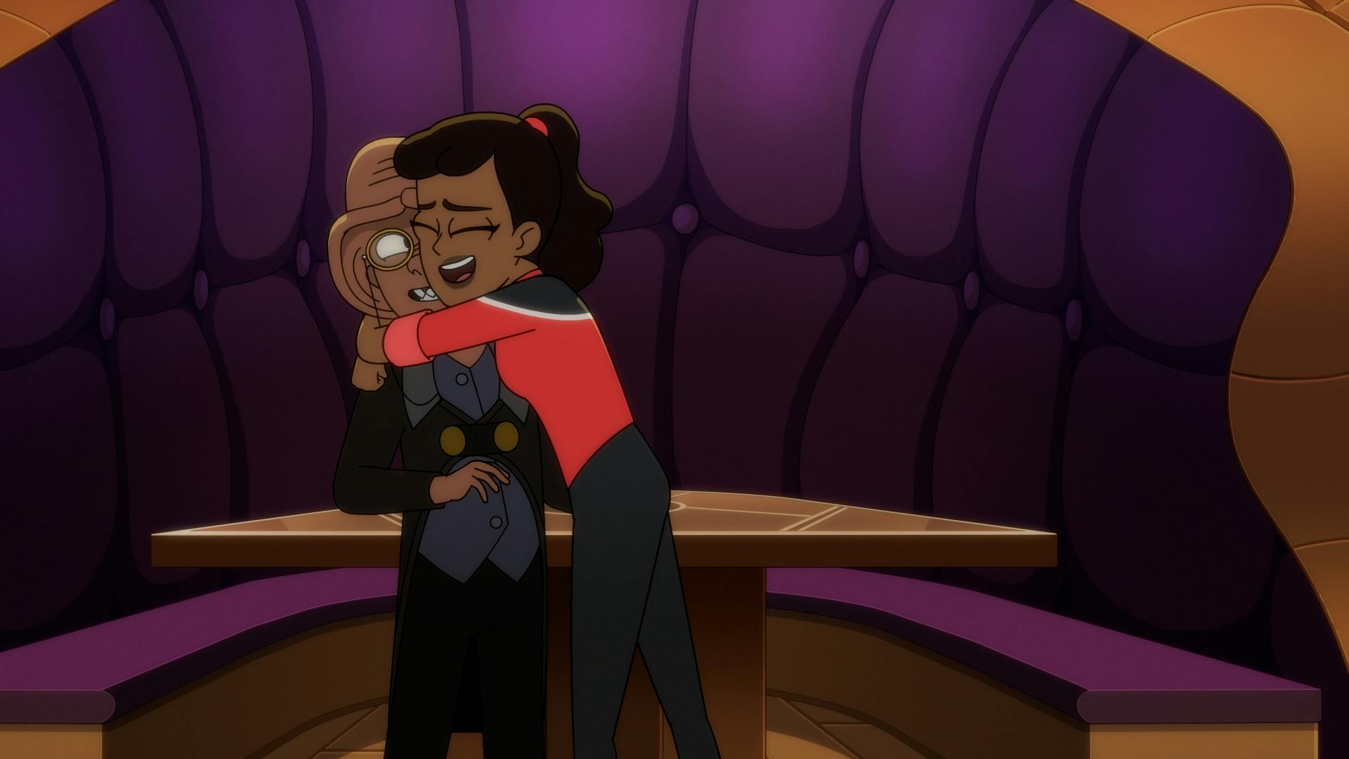 Mariner hugs Quimp in front of a purple plush booth in 'Parth Ferengi's Heart Place'