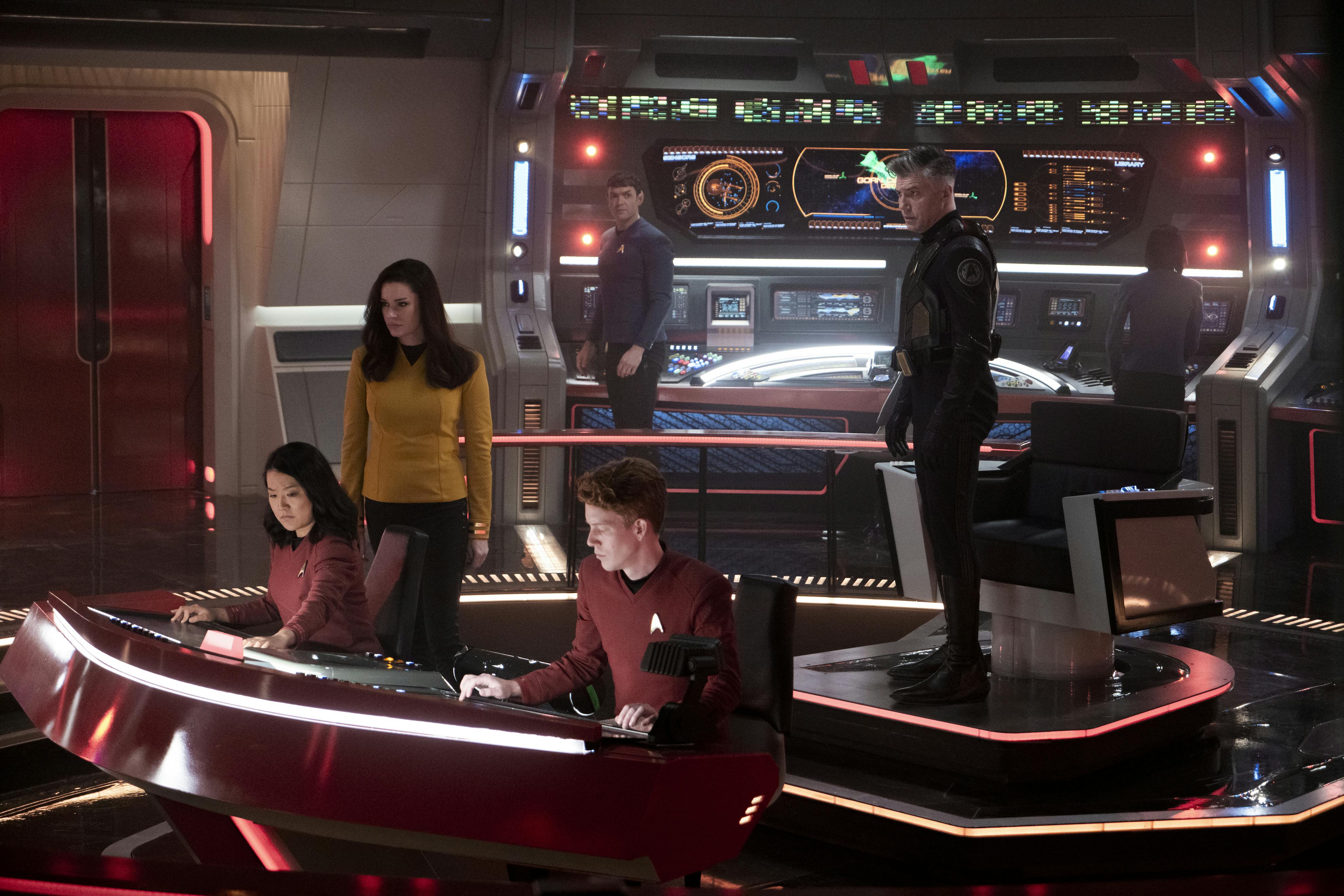 The Enterprise, on red alert, prepares to beam their colleagues and survivors off of Pernassus Beta in 'Hegemony'