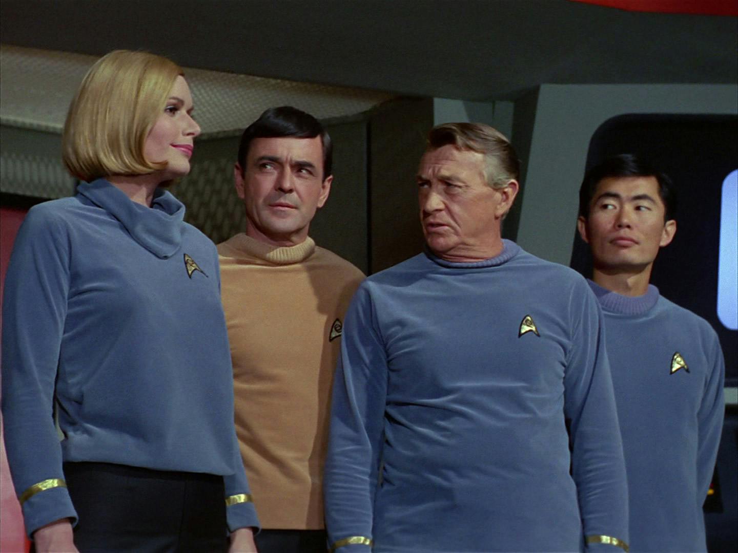Dr. Elizabeth Dehner, Montgomery Scott, Dr. Mark Piper, and Hikaru Sulu report to the Bridge in 'Where No Man Has Gone Before'