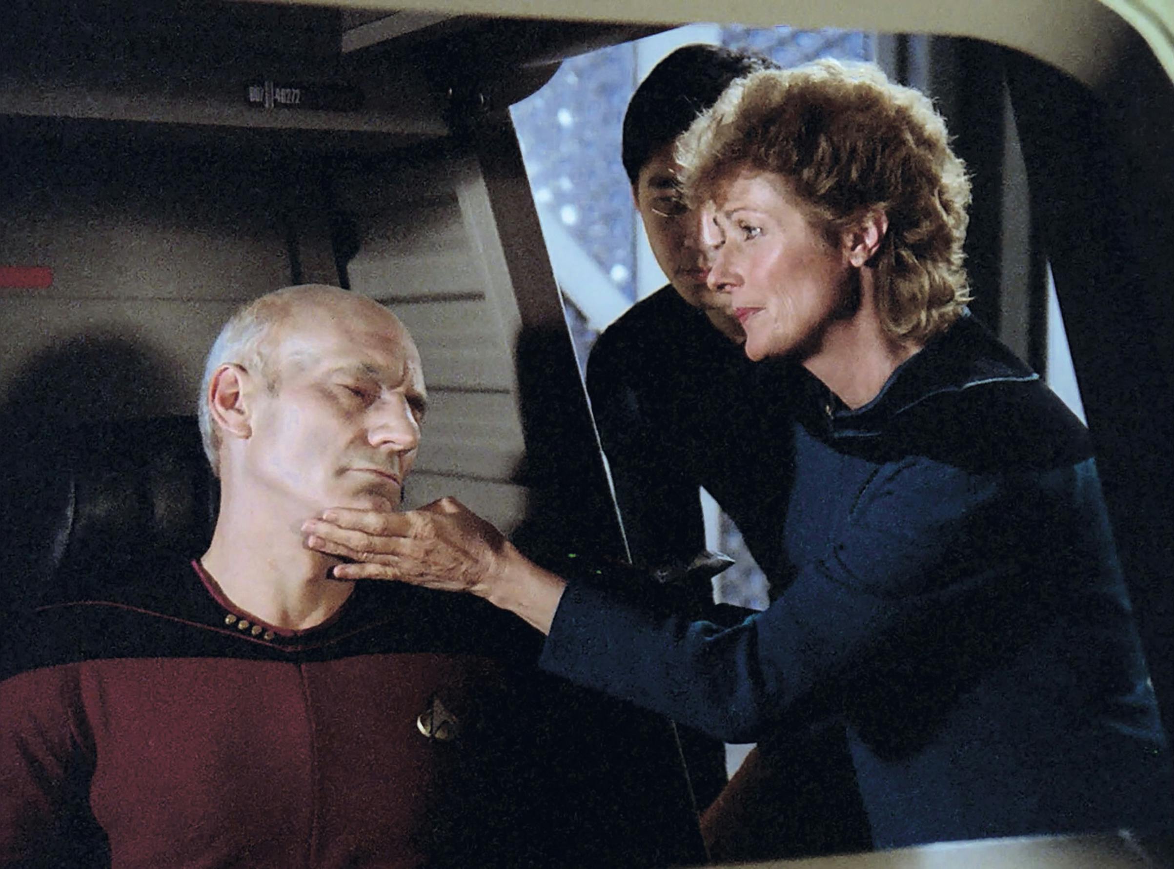 Dr. Pulaski scans the brain functions of an unconscious Jean-Luc Picard found in their Federation shuttle in 'Time Squared'