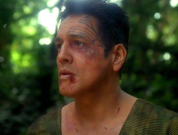 A bruised and beaten Chakotay is held captive on a Delta Quadrant world in 'Nemesis'