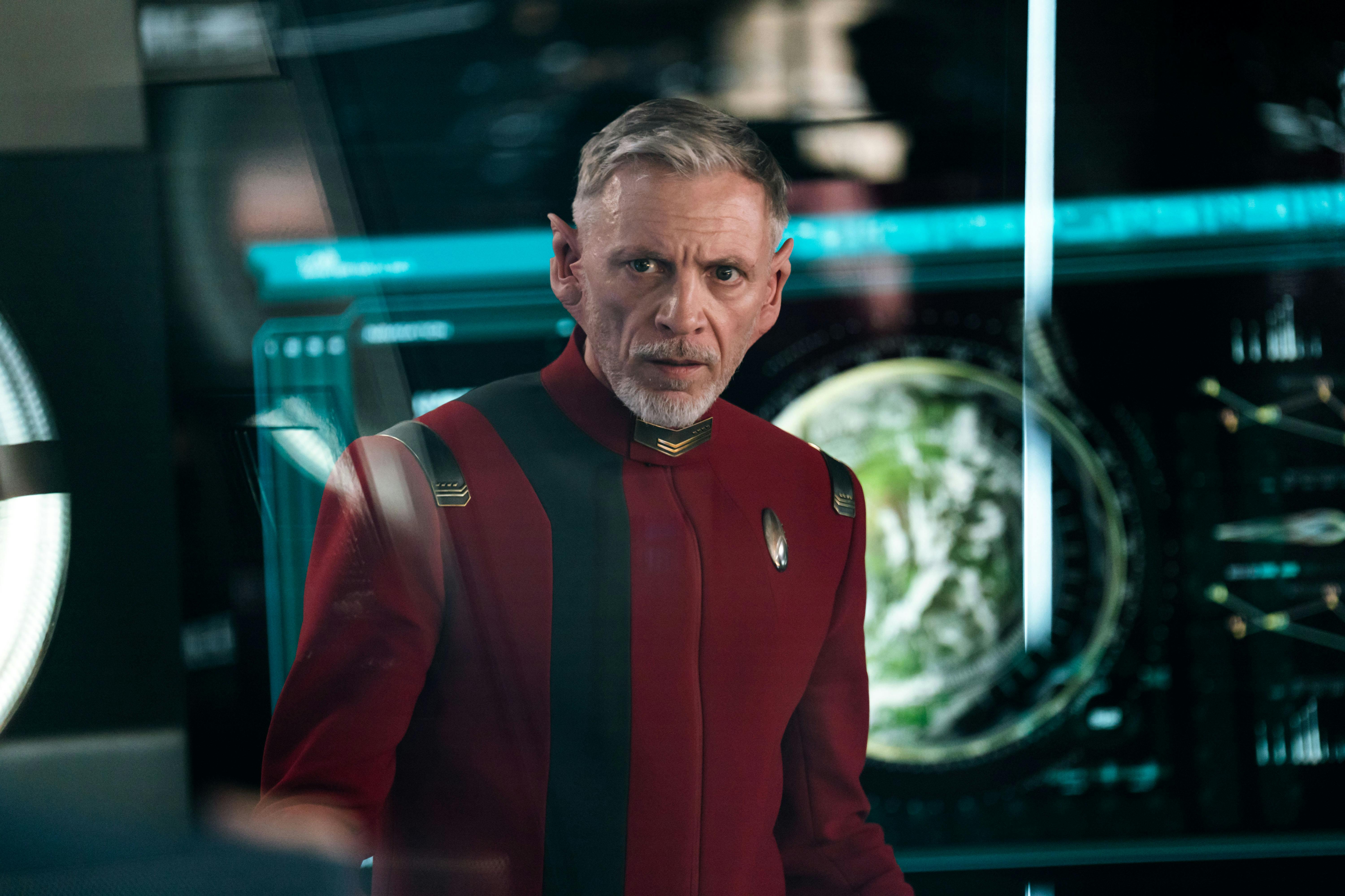 A hologram of Captain Rayner appears in Discovery's Engineering room to aid Tilly and Adira as they monitor Burnham and Saru's presence on Lyrek in 'Under the Twin Moons'