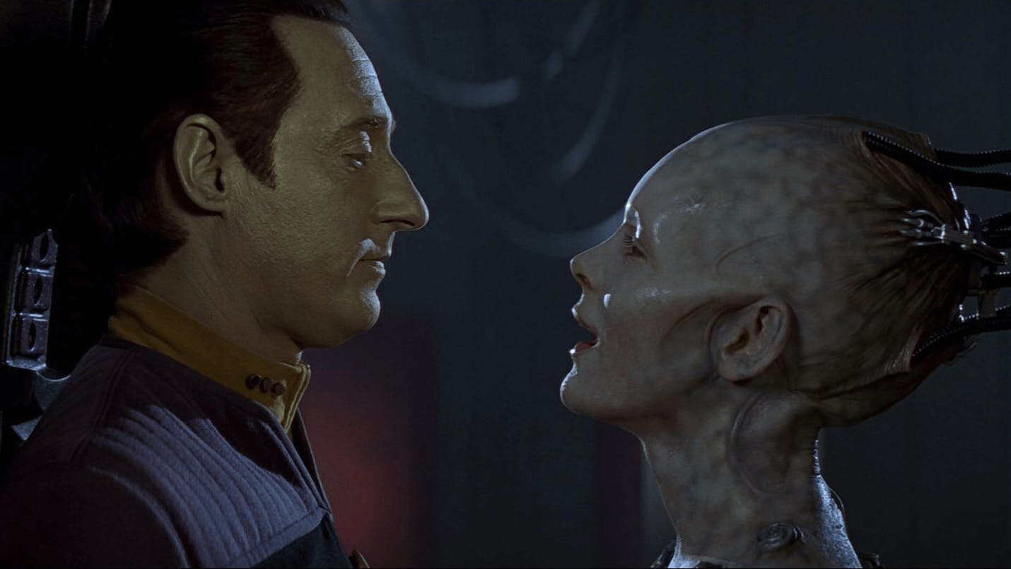 Data stands directly face-to-face with the Borg Queen in Star Trek: First Contact