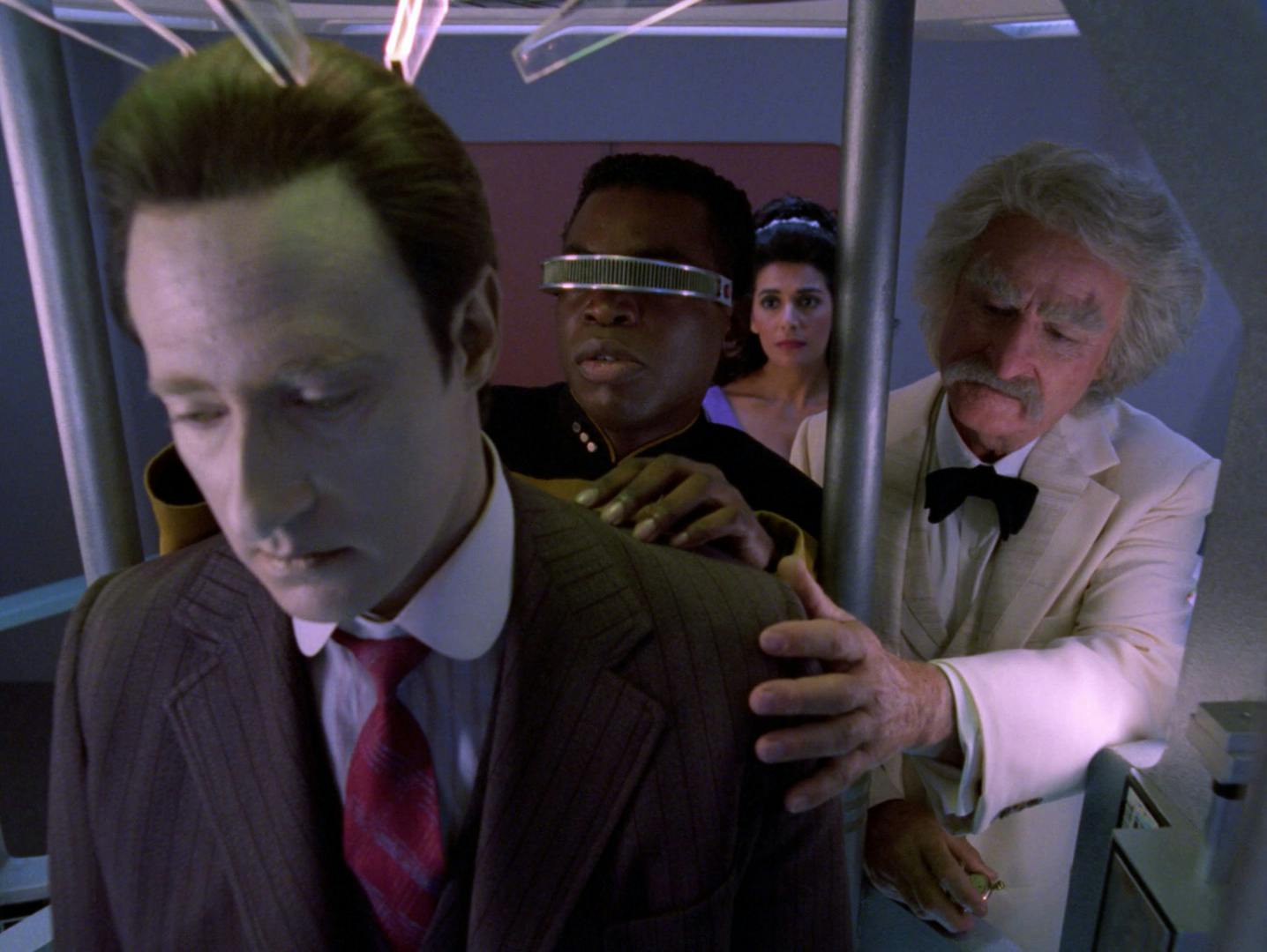In the science lab, as Geordi works to reactivate Data, Samuel Clemens aka Mark Twain reaches out and touches Data's shoulder and apologizes for misjudging him in 'Time's Arrow, Part II'