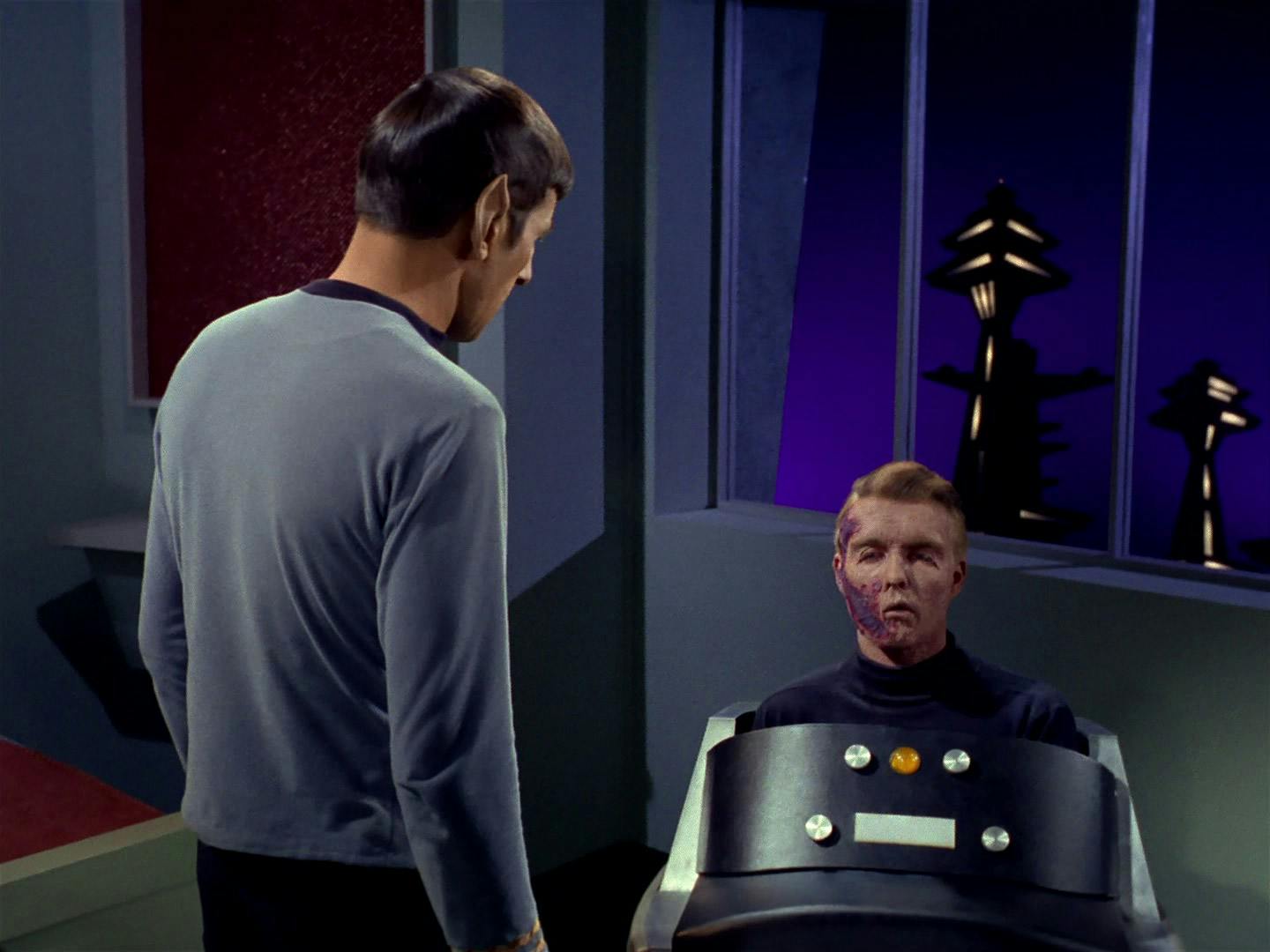 Spock approaches the disfigured and paralyzed Christopher Pike in 'The Menagerie, Part I'
