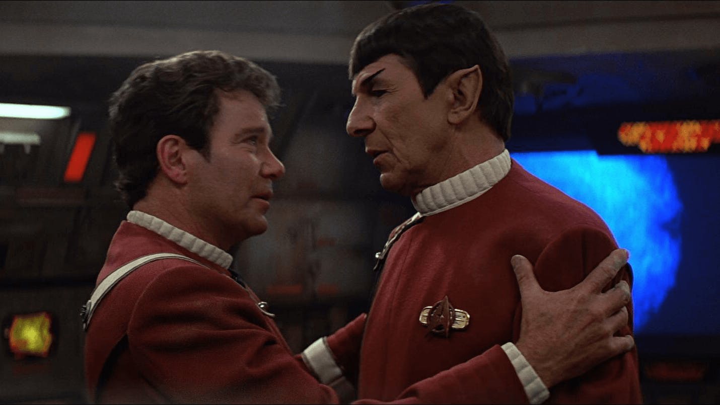 Header image for Star Trek V: The Final Frontier showing James T. Kirk grasping Spock's shoulders