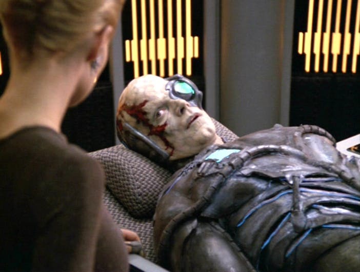 In Sickbay, the Borg One lays down in a medbed solemnly looks over at Seven of Nine in 'Drone'