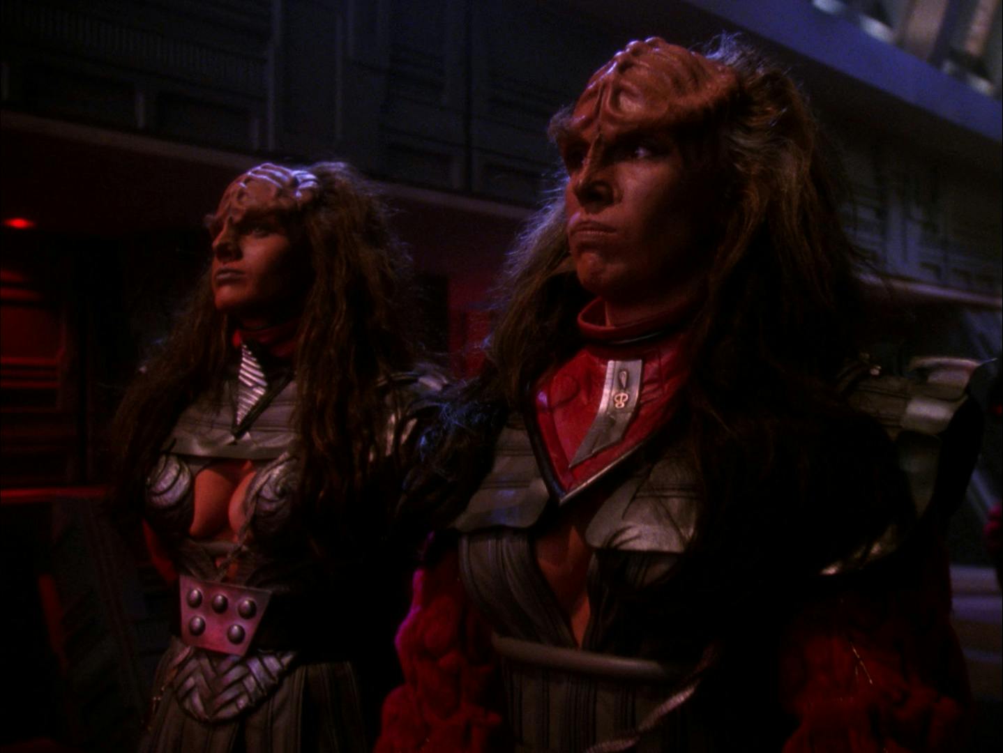 The Duras Sisters - Lursa and B'Etor - stands before the Klingon High Council in 'Redemption'