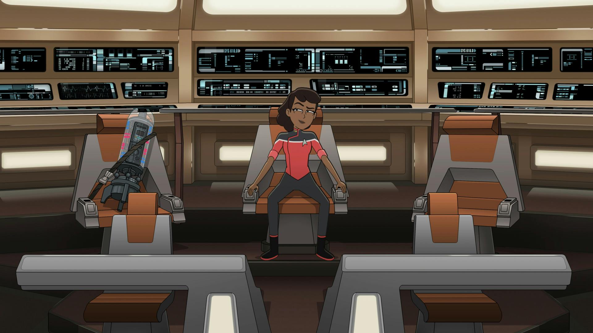 Mariner smugly sits in the captain's chair on the bridge of the U.S.S. Passaro with the Ferengi Genesis Device strapped in the seat next to her in 'Old Friends, New Planets'