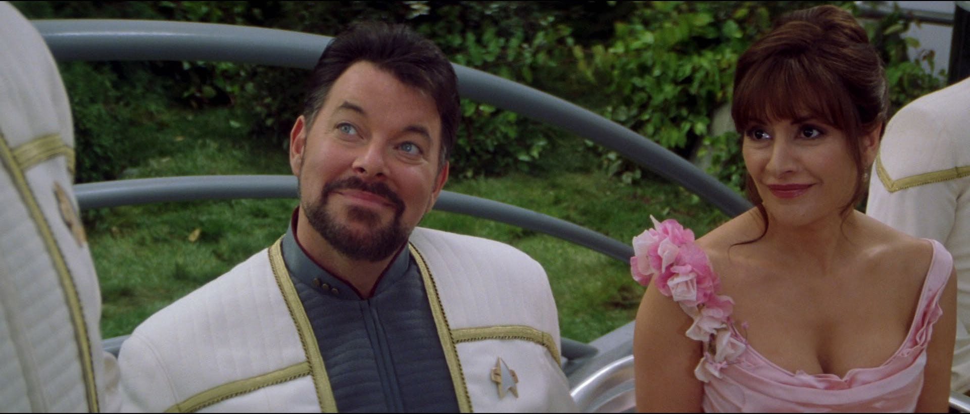 Newlyweds Will Riker and Deanna Troi at their wedding reception in Star Trek Nemesis