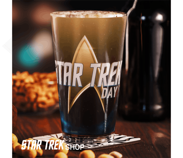 pint glass with 'Star Trek Day' logo on it