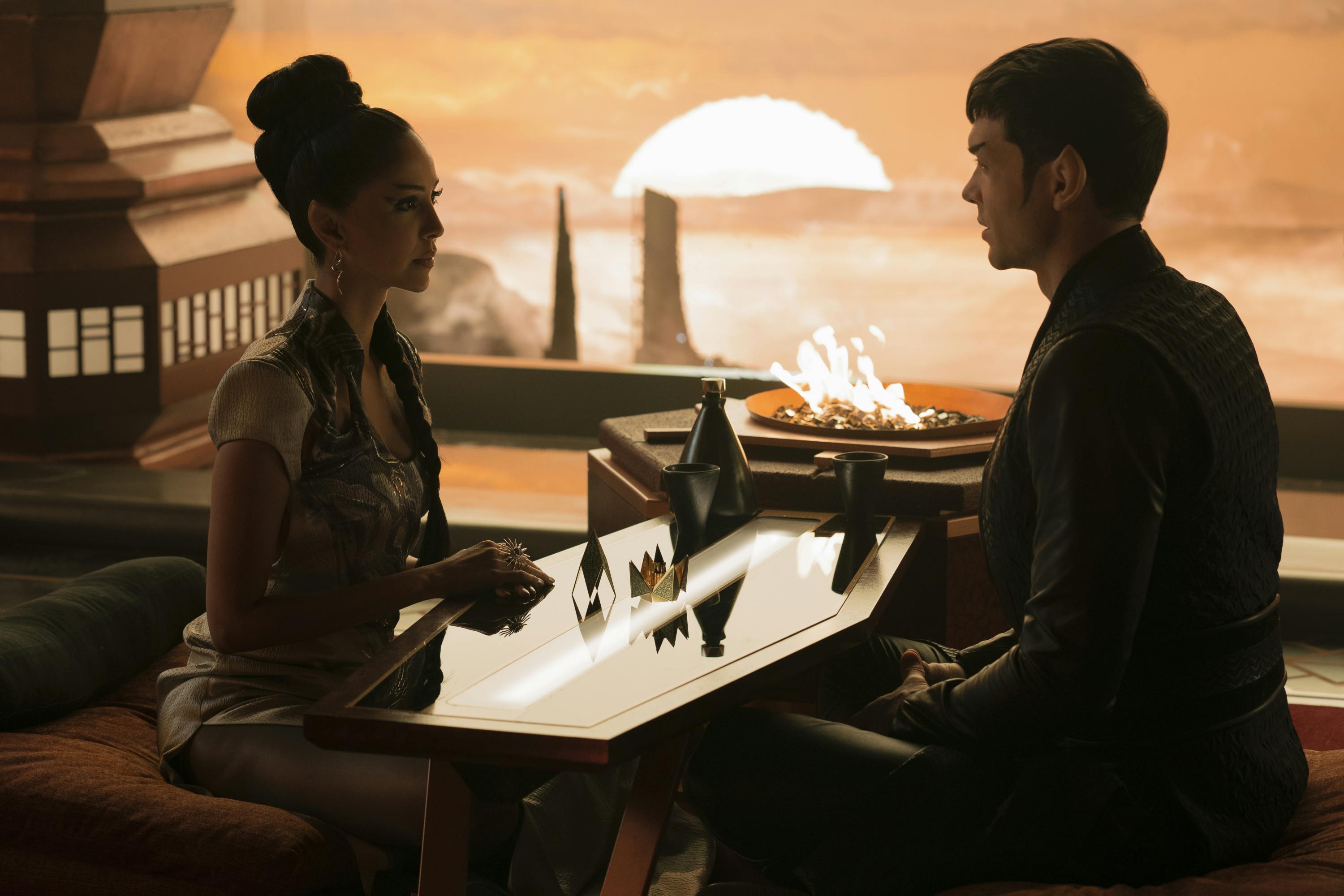T'Pring, in Vulcan mating colors, proposes to Spock during a romantic dinner on Vulcan in 'Strange New Worlds'