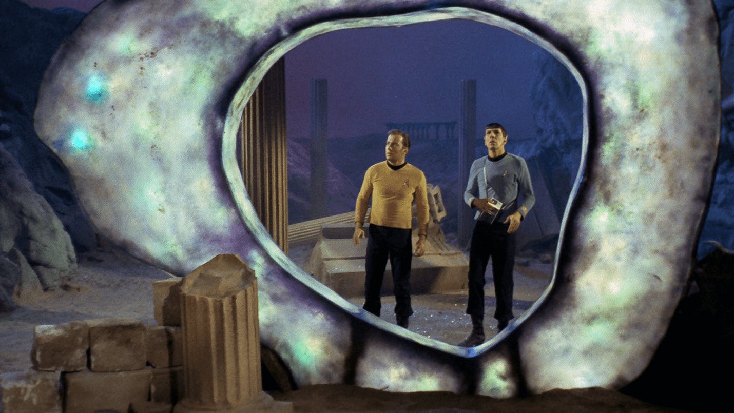 Header image for Star Trek: The Original Series showing James T. Kirk and Spock behind the Guardian of Forever