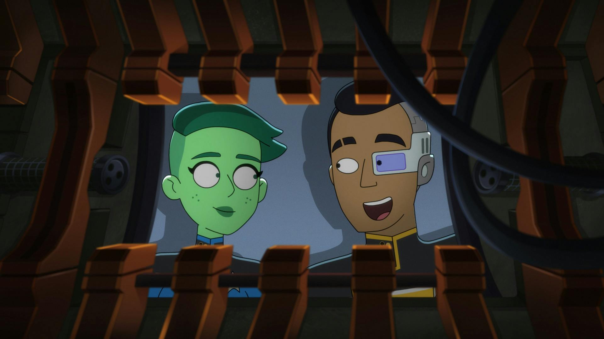 In the repair bay, Tendi and Rutherford look over at one another while working underneath a shuttle in 'Parth Ferengi's Heart Place'