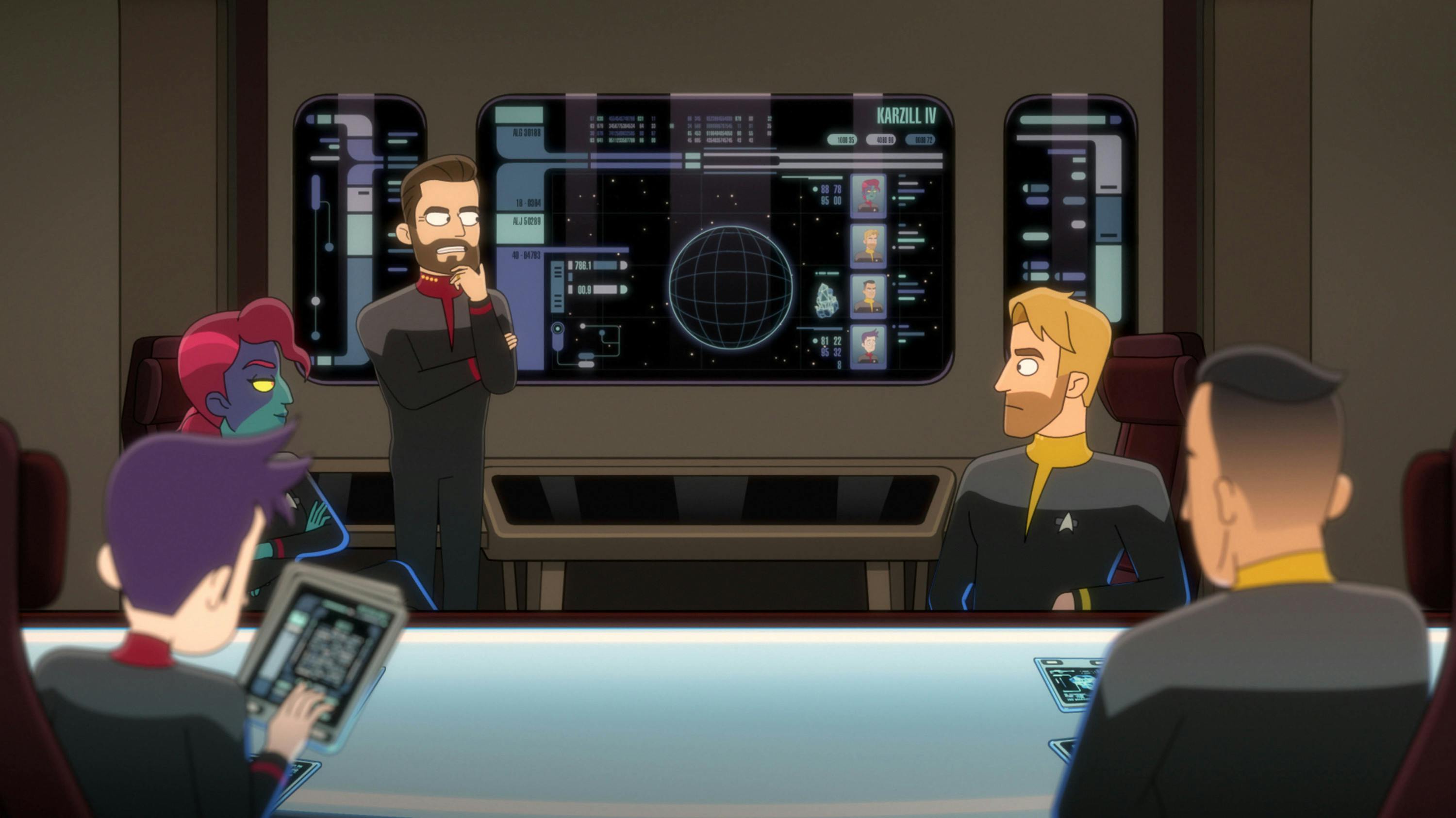 Captain Will Riker leads a debriefing on the Titan's ready room as Brad Boimler holds his PADD in 'Kayshon, His Eyes Open'