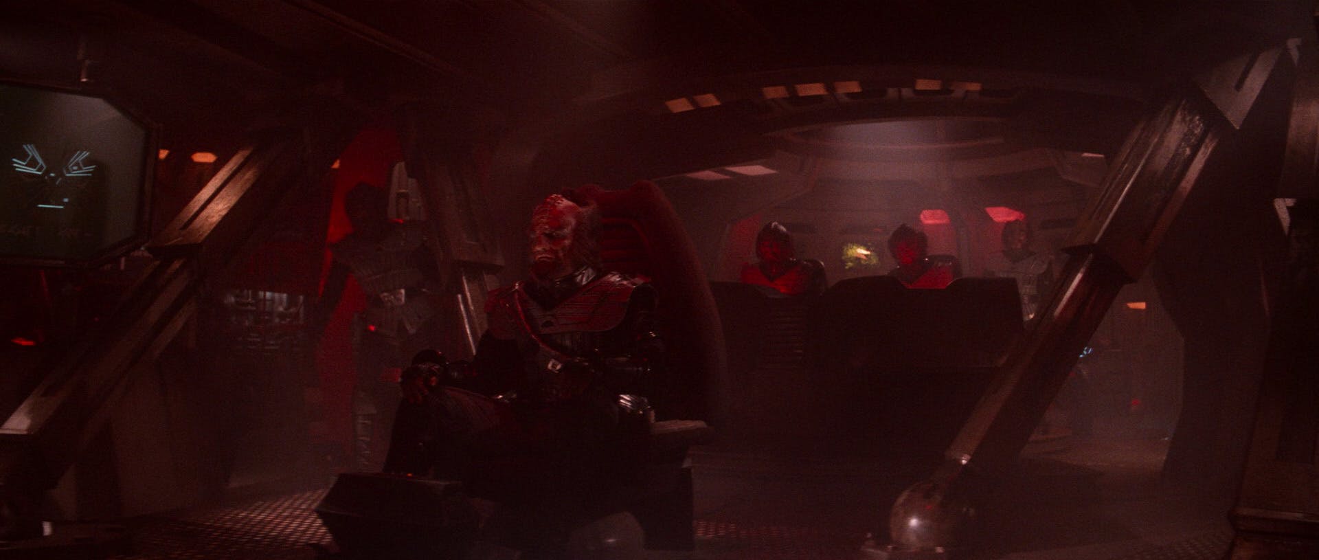 The IKS Amar in Klingon space as the Klingon captain and his crew encounters a huge cloud-like anomaly and ponder how to proceed in Star Trek: The Motion Picture