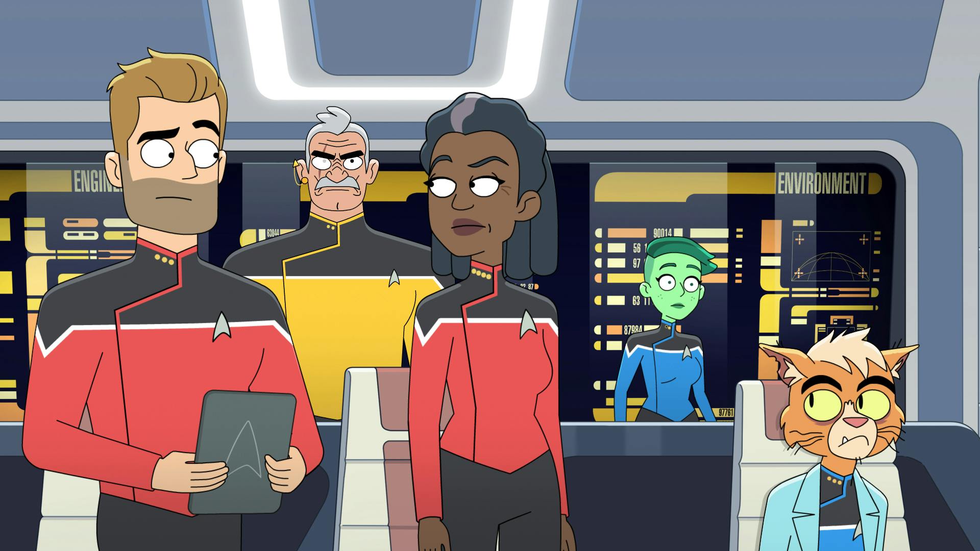 On the Bridge of the Cerritos, Ransom holds his PADD while standing next to Captain Freeman as a seated Dr. T'Ana looks over towards them while Shaxs and Tendi stands behind them