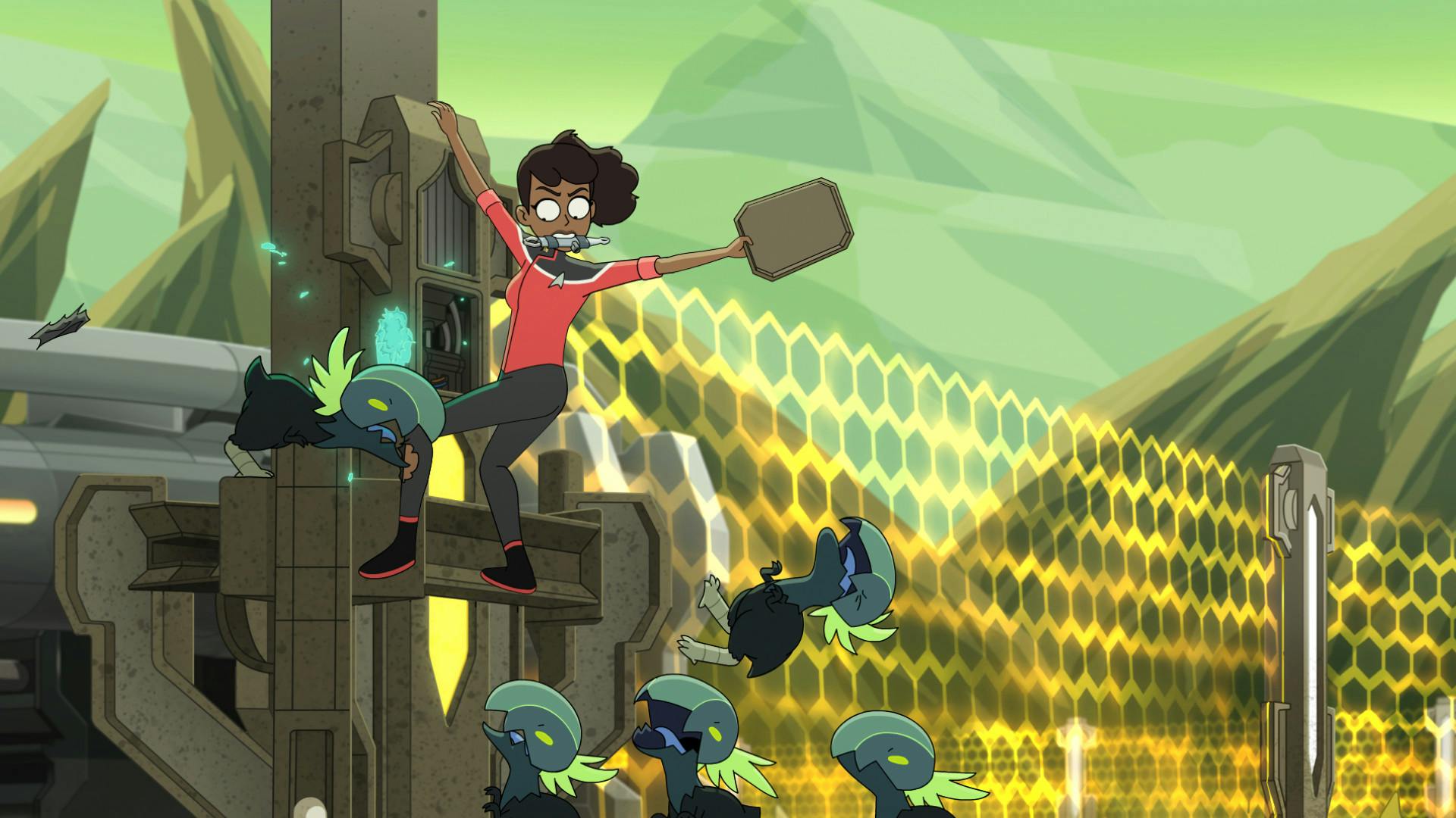 Mariner, with a screwdriver in her mouth, rips the door off a control panel for a glitchy energy field gate as alien chickens surround her