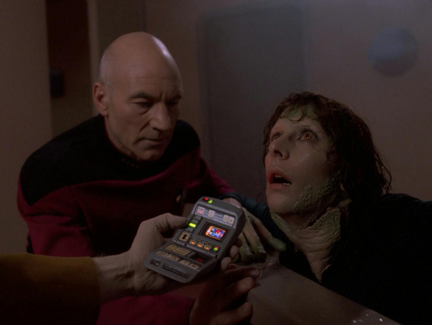 Data analyzes Deanna Troi's de-evolution into an amphibian as Picard expresses concern for his crew in 'Genesis'