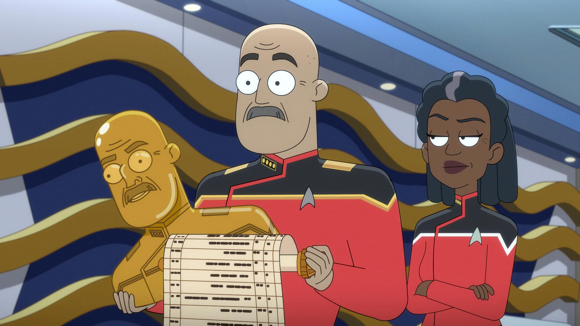 Aboard the U.S.S. Toronto, Admiral Vassery lifts up a gifted ceremonial golden bust of himself in one arm while experiencing shock from the ceremonial invoice as Captain Freeman stands beside him with her arms crossed in 'Parth Ferengi's Heart Place'