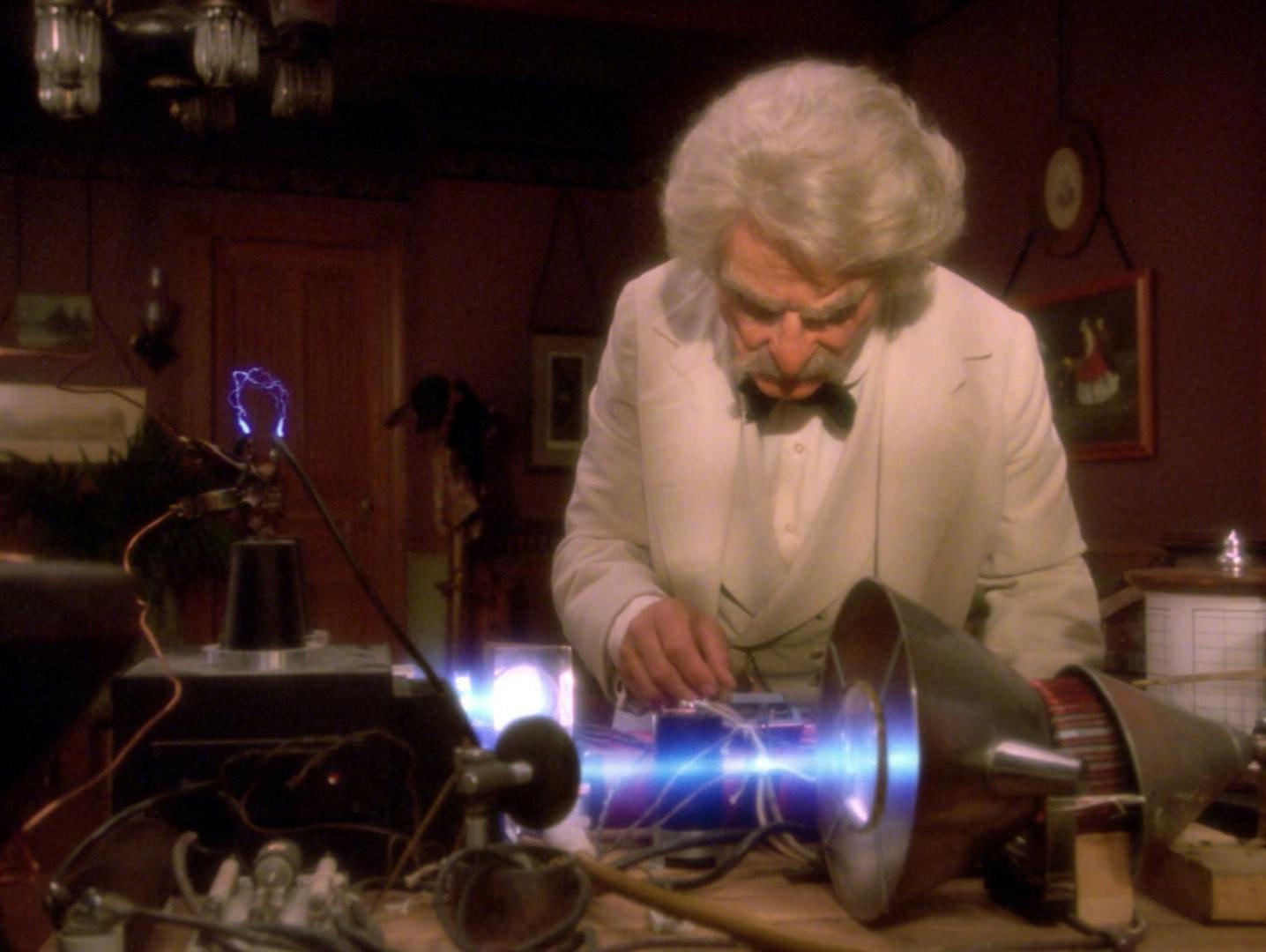 Samuel Clemens aka Mark Twain snoops around in Data's hotel room and tampers with a piece of a transceiver device in 'Time's Apart, Part II' 