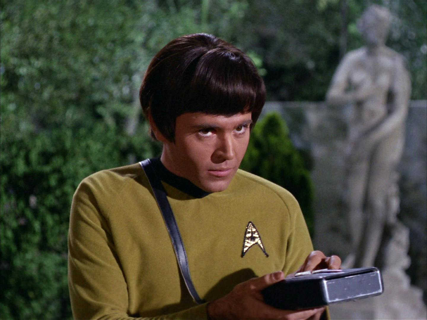 Chekov looks up from his scanner when a humanoid alien proclaims he's the god Apollo in 'Who Mourns for Adonais?'