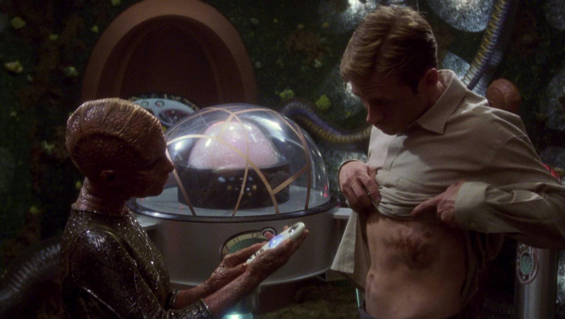 Aboard the Xyrillian ship, Ah'len examines Trip Tucker's body discovering the female embryo within him in 'Unexpected'