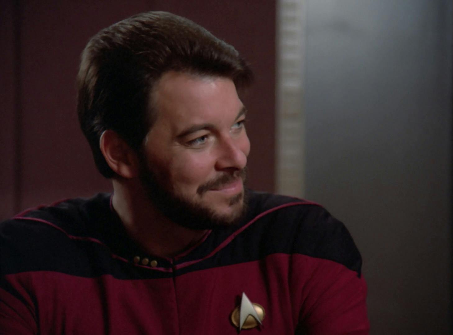 Close-up of Will Riker's side profile as he smiles in 'The Child'