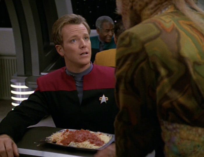 In Voyager's mess, Tom Paris sits down with a bowl of Alfarian hair pasta prepared by Neelix in 'Parturition'