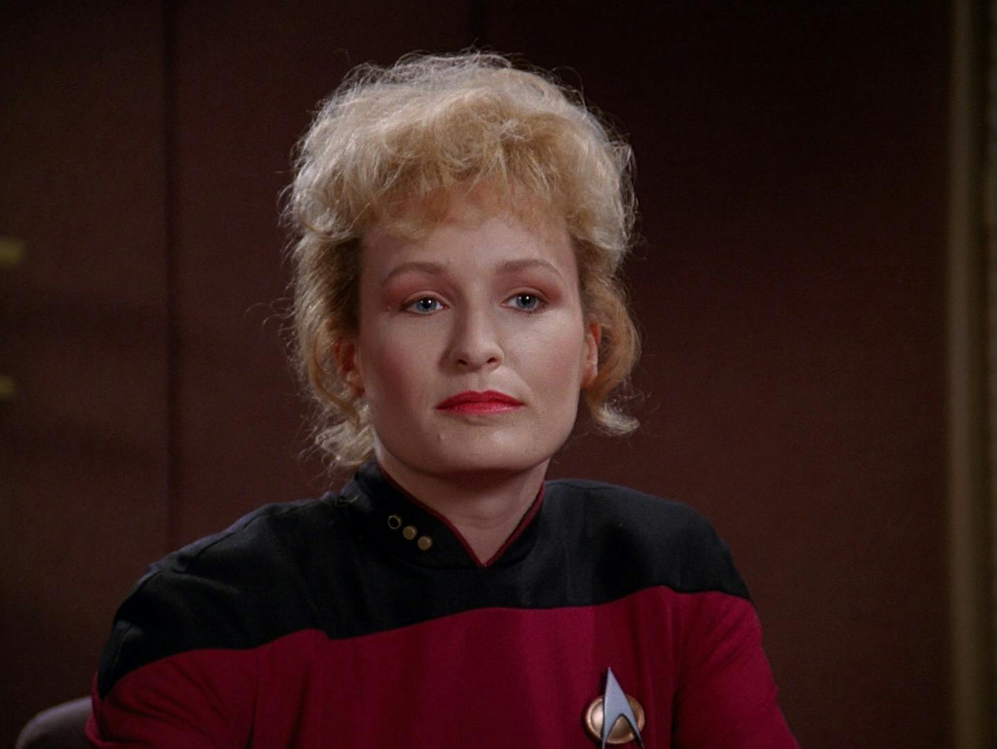 Close-up of Lt. Commander Elizabeth Shelby sits in Picard's ready room in 'The Best of Both Worlds, Part I'