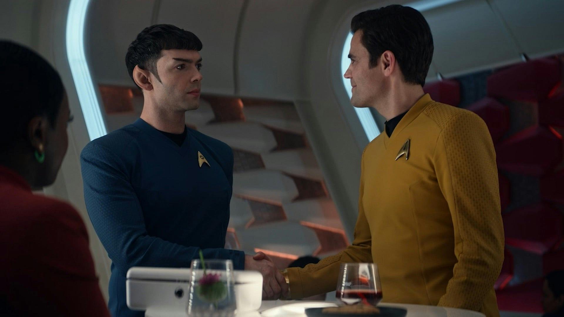 Uhura observes Spock and James T. Kirk meet each other and shake hands in the forward lounge in 'Lost in Translation'