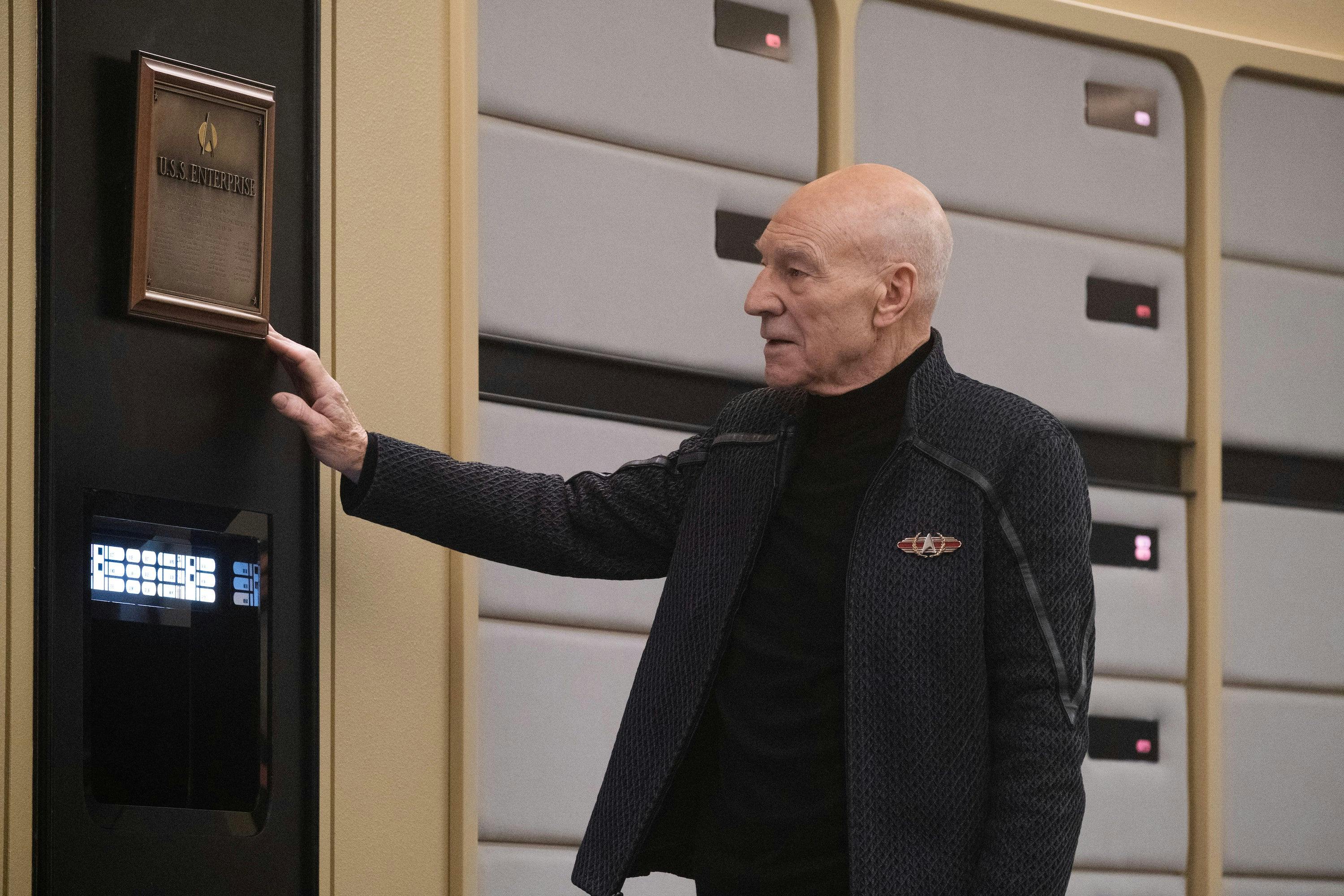 Picard reflects while look at the plaque aboard the reconstructed Enteprise-D in 'Vox'