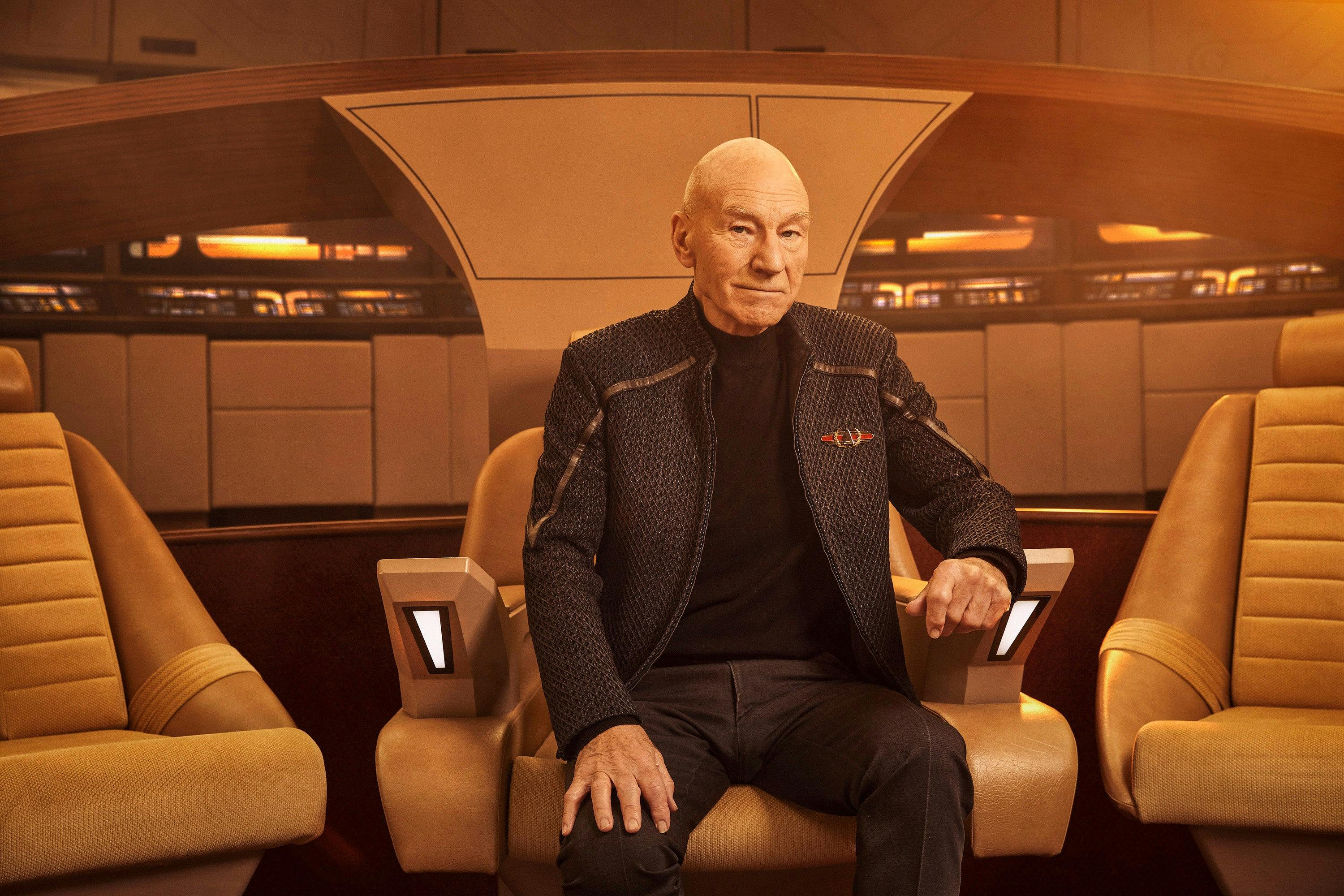 Jean-Luc Picard sits in the Captain's Chair on the bridge of the reconstructed Enteprise-D