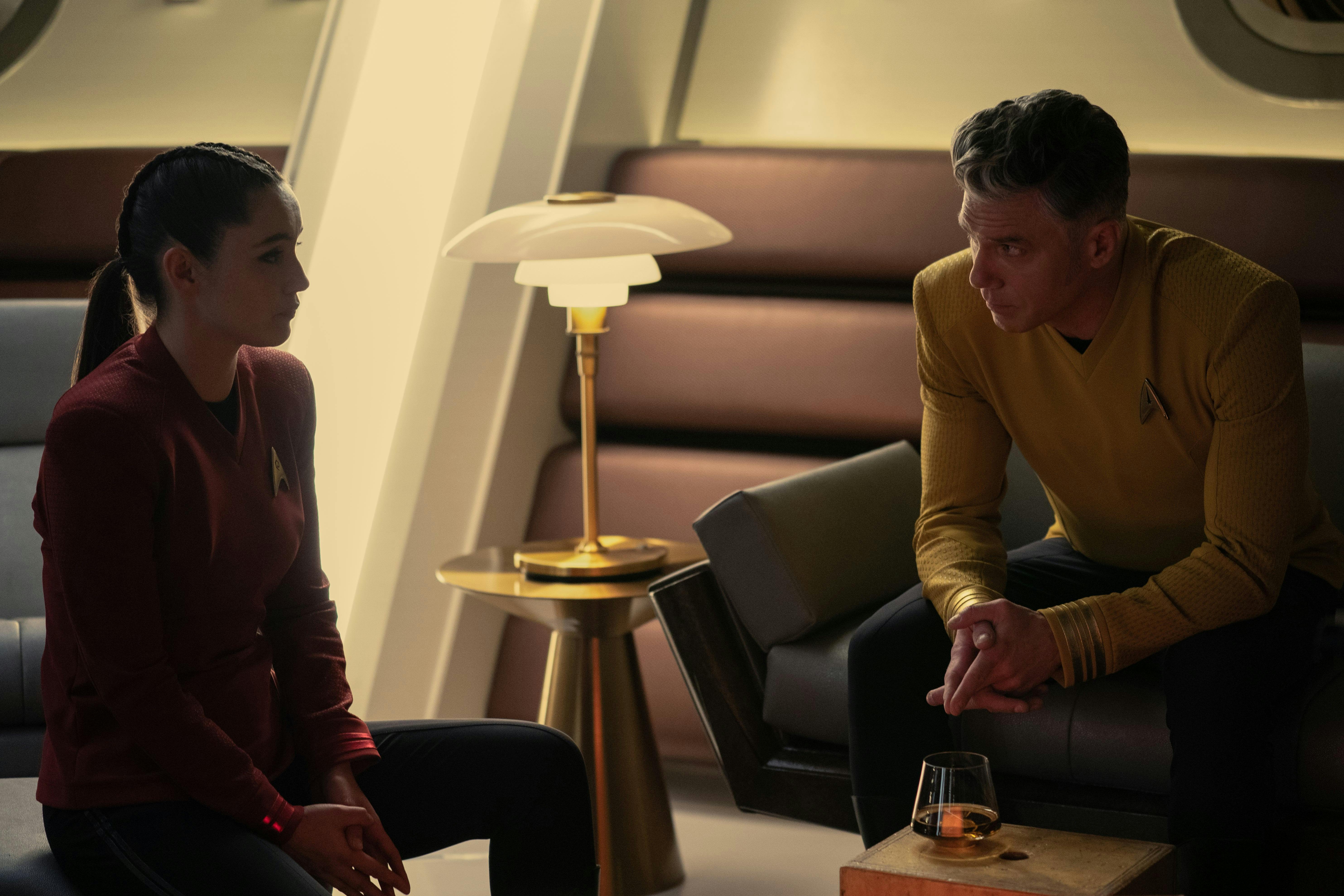 Captain Pike (Anson Mount) is in conference with La'An (Christina Chong) in his ready room.