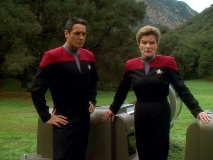 Chakotay and Janeway stranded on a planet next to their pods in 'Resolutions'