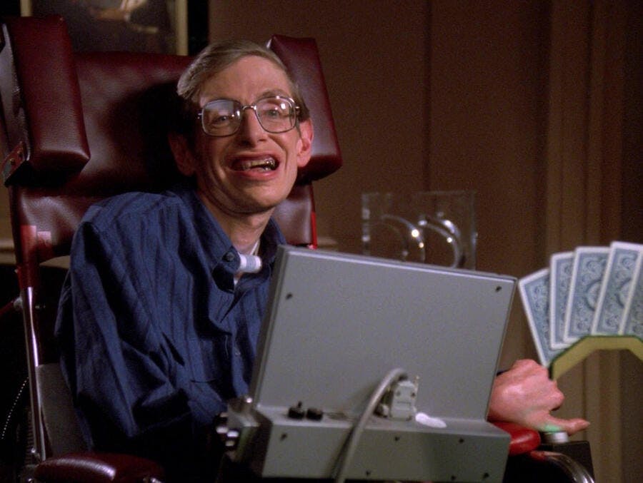 Dr. Stephen Hawking, playing himself, takes in a poker game in 'Descent, Part I'