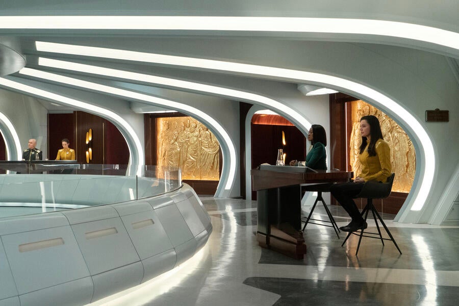 Pasalk and Batel on one side of the Starfleet court room and Una Chin-Riley and her lawyer Neera Ketoul opposite them in 'Ad Astra per Aspera'