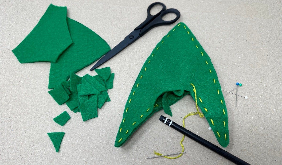 Starfleet Insignia Holiday Craft by Kelly Knox - Sew the green felt sheets of the Starfleet insignia